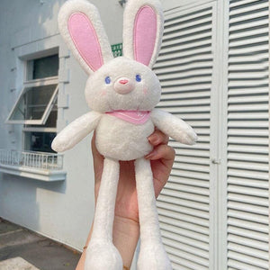 Poupée lapin en peluche